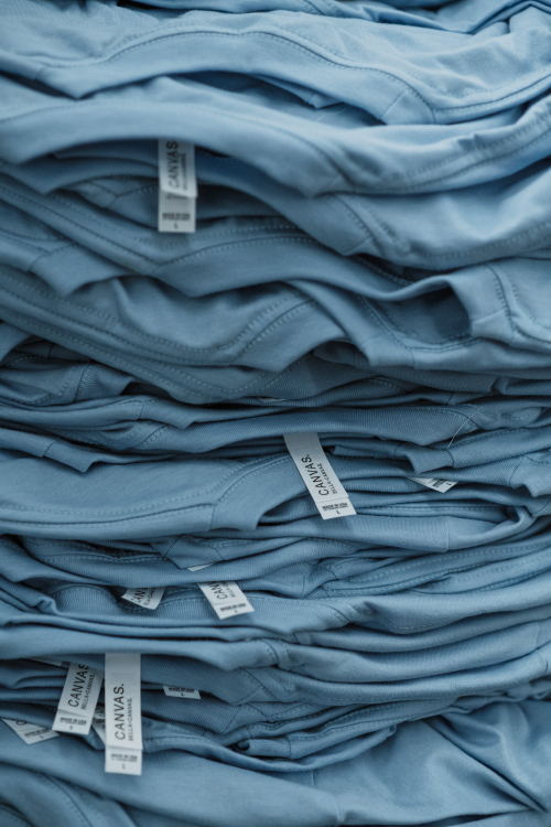 stacked blue t-shirts