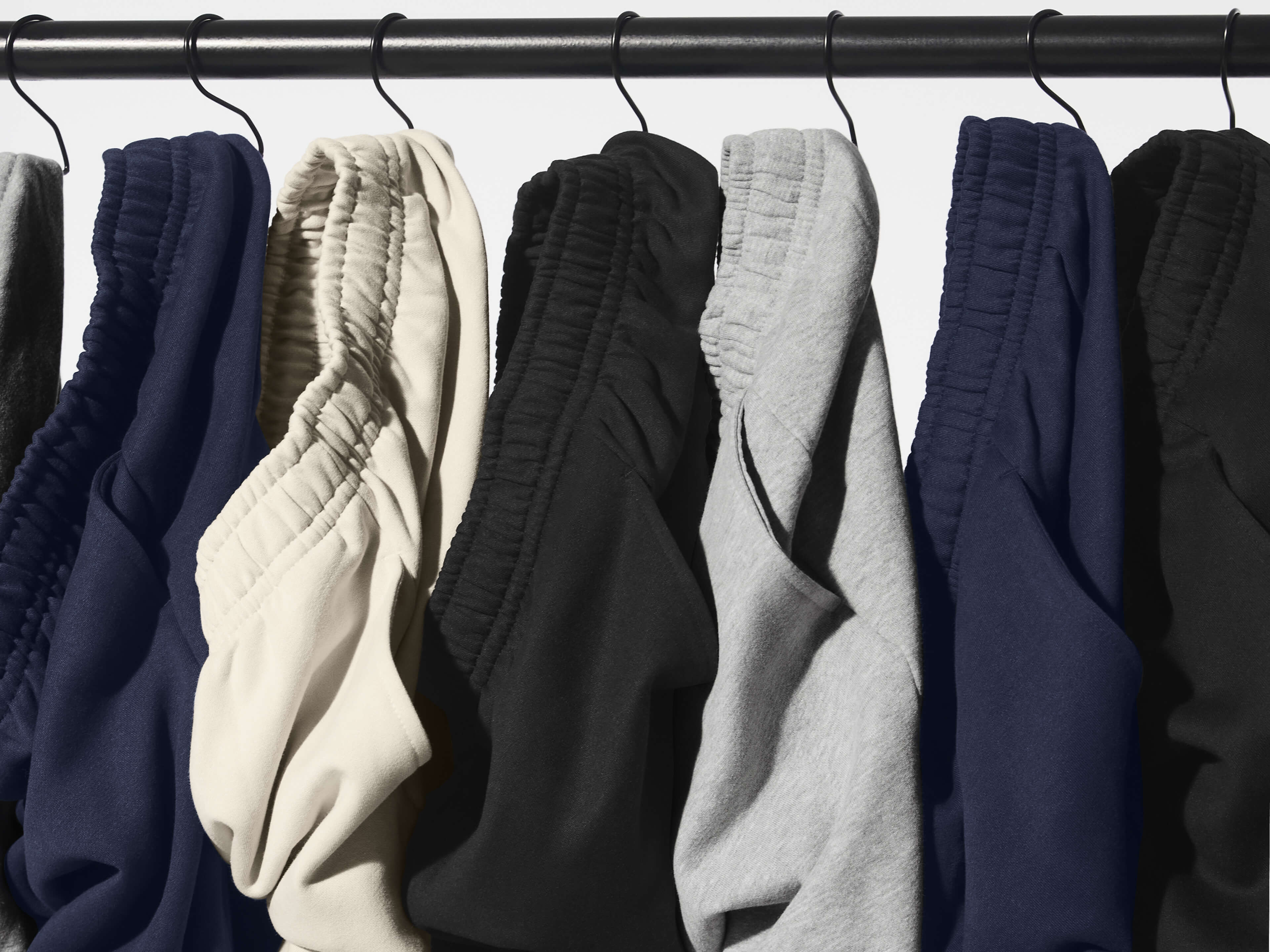 sample room filled with t-shirts on various colors