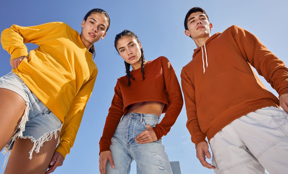 3 people in bella+canvas fleece looking down at camera